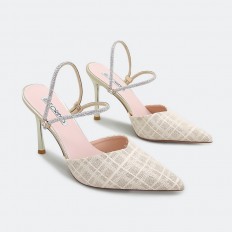 Patterned heeled chic...